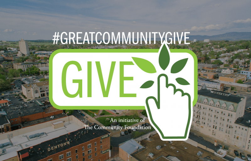 Background is a birds eye view of downtown Harrisonburg buildings with the Great Community Give Logo in the center. Text reads "#GreatCommunityGive, an initiative of The Community Foundation"