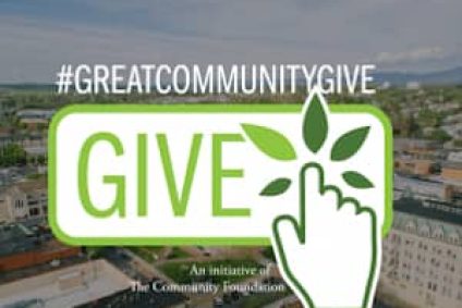 The logo reads give, it is white with green boarders and text, with a hand clicking on a dark green plant, this is pasted over an image of Harrisonburg